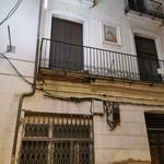 Cau una part d'un balcó just després de passar la processó